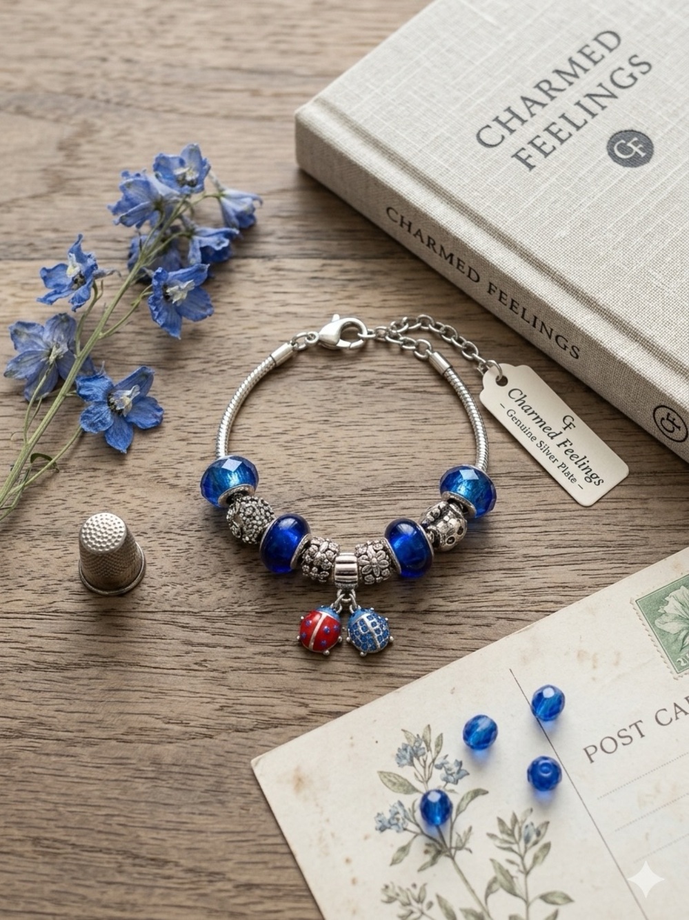 Charmed Feelings Blue Glass Bead Bracelet with Silver Accents